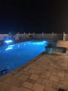 Pool at night with LED lighting and sheer descent water feature – Marin County