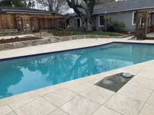 Pool with new paver deck and waterline tile – Marin County