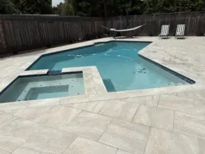 Pool with attached spa and light paver deck – Marin County